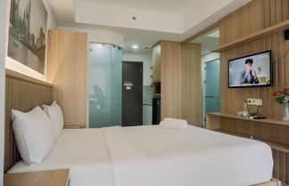 Foto 2 - Good And Homey Studio At Pacific Garden Alam Sutera Apartment