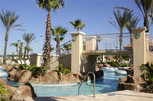 Photo 12 - Regal Palms Resort 4 Bedroom Townhome! Townhouse by RedAwning