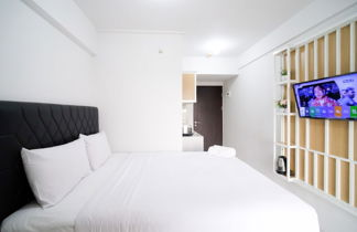 Photo 3 - New Studio Apartment With Strategic Location At Suncity Residence