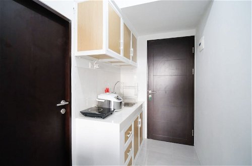 Photo 5 - New Studio Apartment With Strategic Location At Suncity Residence