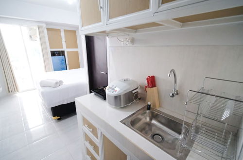 Photo 8 - New Studio Apartment With Strategic Location At Suncity Residence