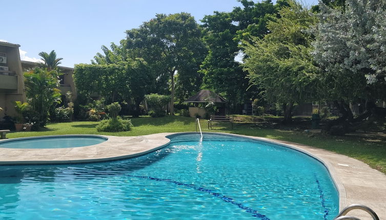 Photo 1 - City Charm & Poolside Peace -Gated