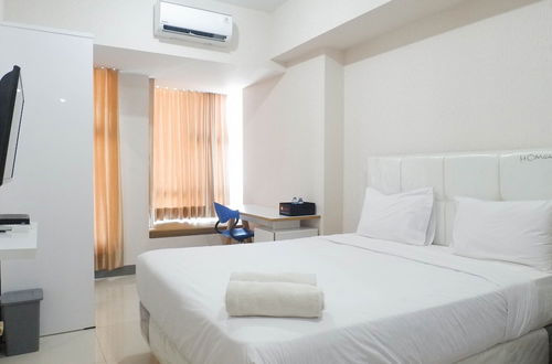 Photo 2 - Delightful Luxurious Studio Apartment Connected to Pakuwon Mall at Supermall Mansion