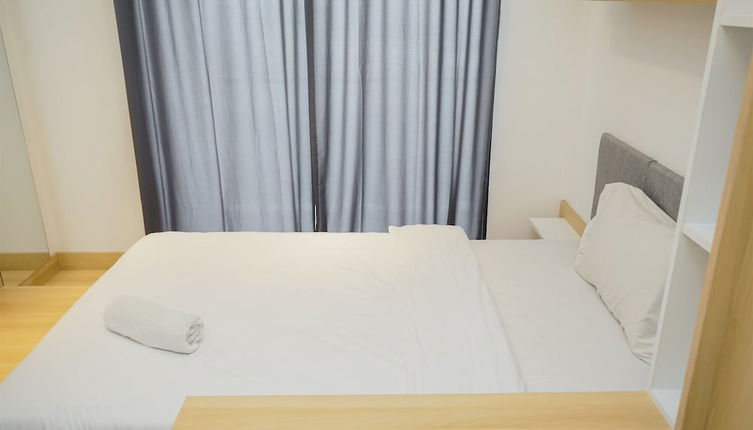 Photo 1 - Cozy Studio Room At Sky House Bsd Apartment