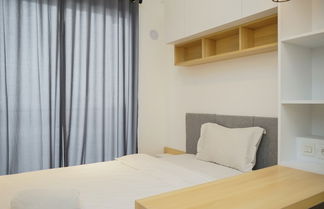 Foto 3 - Cozy Studio Room At Sky House Bsd Apartment