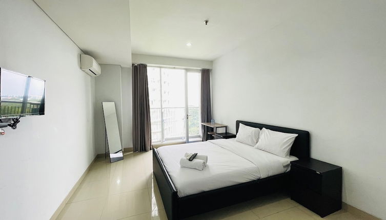 Photo 1 - Cozy Studio Room At Dago Suites Apartment