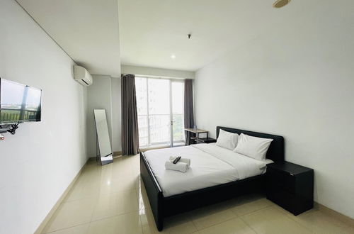 Photo 1 - Cozy Studio Room At Dago Suites Apartment