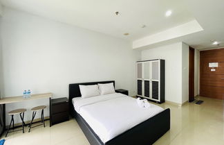 Photo 3 - Cozy Studio Room At Dago Suites Apartment