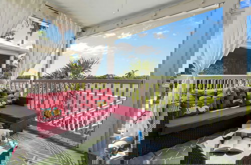 Photo 13 - Coral Breeze by Avantstay Close to Beach w/ Balcony & Shared Pool! Month Long Stays Only