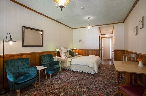 Foto 10 - Settlers Cottage Motel