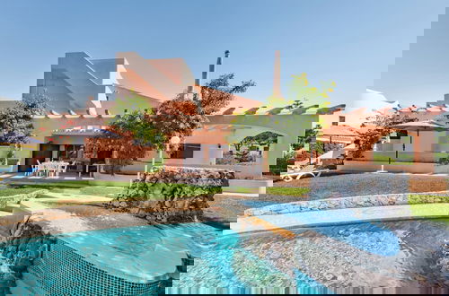 Photo 22 - Set in Good Sized, Mature Gardens Which Afford a Very Good Degree of Privacy and