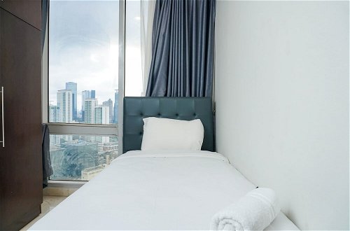 Photo 6 - Comfortable Deluxe 2BR at The Empyreal Condominium Epicentrum Apartment By Travelio