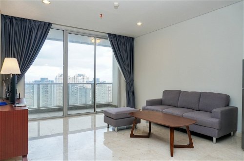 Photo 23 - Comfortable Deluxe 2BR at The Empyreal Condominium Epicentrum Apartment By Travelio