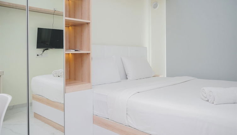 Photo 1 - Cozy Stay And Simply Studio At Sky House Bsd Apartment