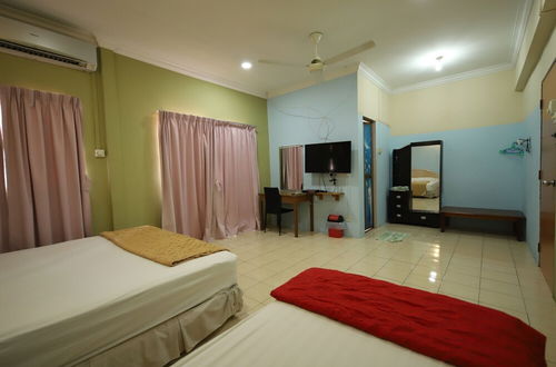 Foto 13 - OYO Homes 90575 C.k Bahau Homestay