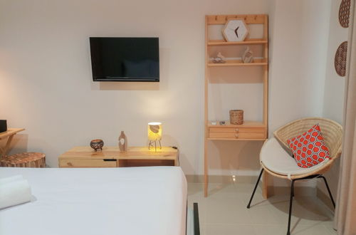 Photo 11 - Cozy Studio At Patraland Amarta Apartment