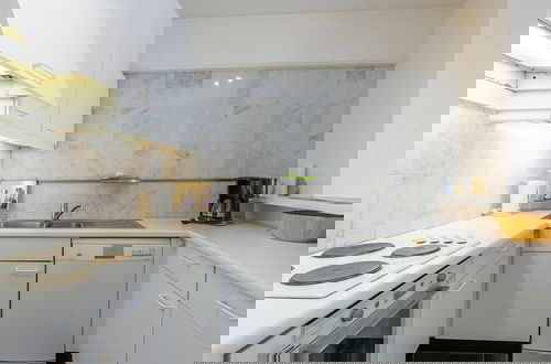 Foto 8 - Nice Apartment With Kitchen