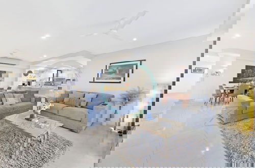 Photo 3 - Zen Ocean Charm 3BR Luxury W Front Apt Pool BBQ