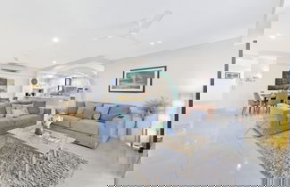 Photo 3 - Zen Ocean Charm 3BR Luxury W Front Apt Pool BBQ