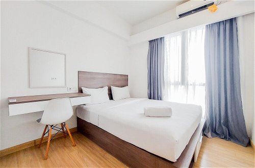 Photo 2 - Comfortable And Homey Living 2Br At Sky House Bsd Apartment