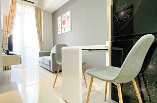 Photo 10 - Minimalist And Cozy 1Br Vasanta Innopark Apartment