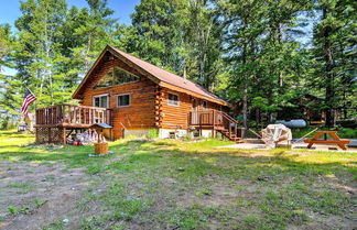 Photo 1 - Cozy Manistique Cabin w/ Deck, Grill & Fire Pit