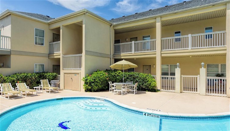 Photo 1 - Courtyard Condo With Pool Only 1/4 Block to Beach