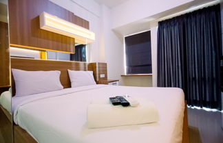 Photo 1 - Cozy Studio At 25Th Floor Vida View Makassar Apartment