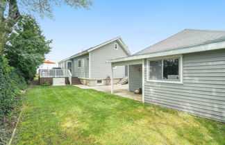 Photo 3 - Chic Manistee Cottage: Steps to Lake Michigan