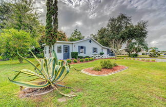 Photo 1 - Peaceful Lady Lake Home w/ Screened-in Porch