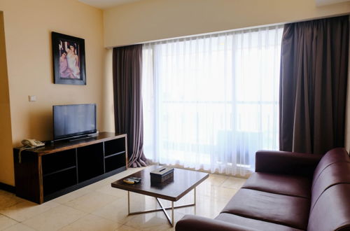 Foto 14 - Homey And Cozy 3Br At Braga City Walk Apartment