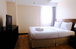 Foto 2 - Homey And Cozy 3Br At Braga City Walk Apartment