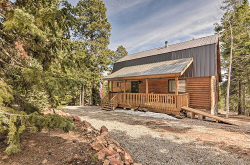 Photo 1 - Duck Creek Village Cabin w/ Deck on Half Acre