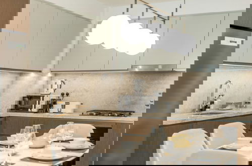 Foto 6 - Modern 2BR w Direct Beach Access, Emaar Beachfront