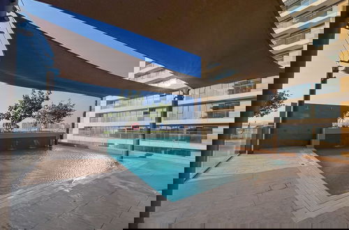 Foto 16 - Modern 2BR w Direct Beach Access, Emaar Beachfront