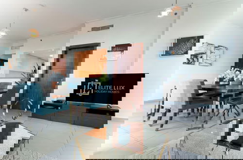 Foto 3 - Elite LUX Holiday Homes - 3BR Full Burj Khalifa Fountain Views in Downtown