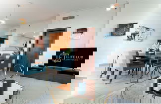 Foto 3 - Elite LUX Holiday Homes - 3BR Full Burj Khalifa Fountain Views in Downtown