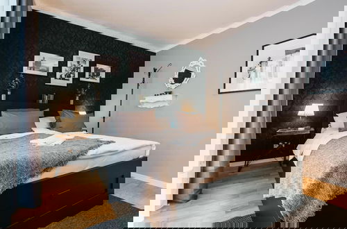 Foto 5 - YoHome - Luxury Downtown Apartment