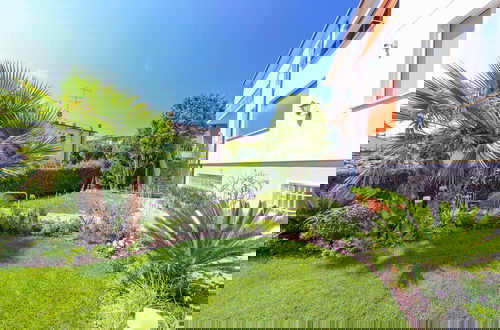 Foto 4 - La Maison Fleurie Appartamento Giglio