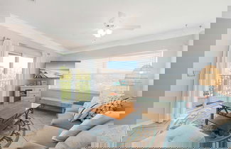 Photo 1 - Seaside Haven Stylish Condo 3 Pools New Rental
