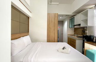 Foto 1 - Modern Look And Warm Studio At Vasanta Innopark Apartment