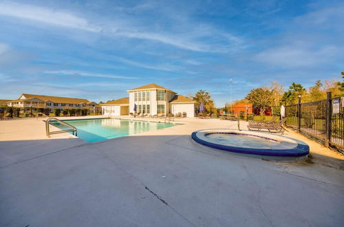 Photo 38 - Tranquil Condo With Pool Fitness Center Tennis