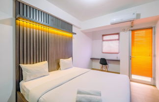 Photo 3 - Warm And Comfort Living Studio Room At Gunung Putri Square Apartment