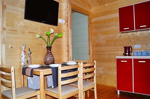 Foto 11 - Cozy Holiday Home in Mielno near Lake