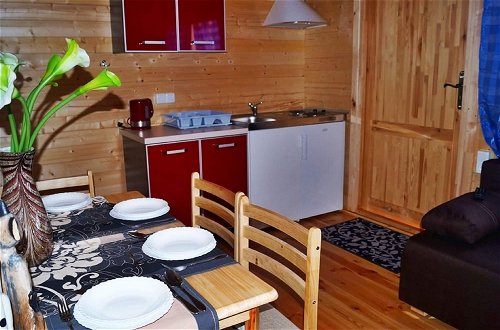Foto 5 - Cozy Holiday Home in Mielno near Lake