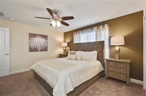 Foto 10 - Charming Vacation Townhome with Pool CG1576