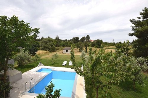 Photo 16 - Apartment in Holiday Home With Pool
