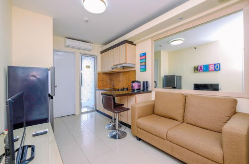 Photo 14 - Comfy 2Br At Bassura City Apartment
