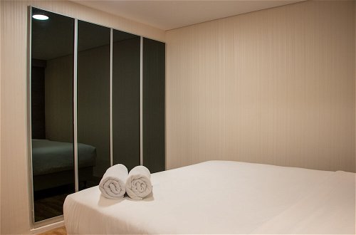 Photo 8 - Comfort 2Br Loft Apartment At Maqna Residence