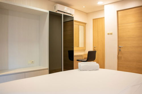 Photo 5 - Comfort 2Br Loft Apartment At Maqna Residence
